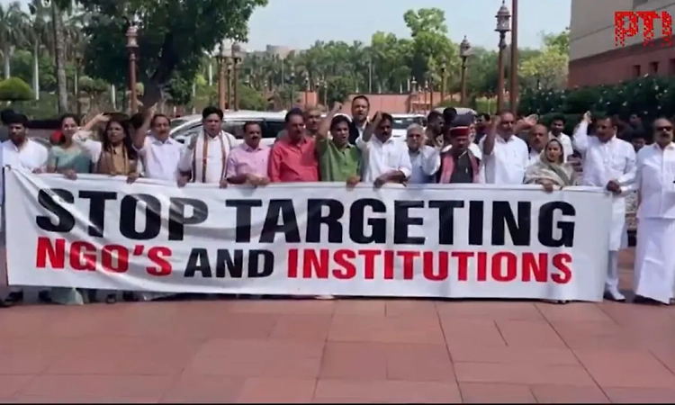 Opposition MPs stage protest in Parliament complex against FCRA amendment bill