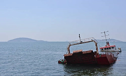 Boat capsizes off Turkish coast after high-speed chase, killing 18 migrants