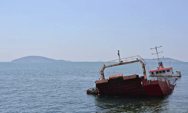 Boat capsizes off Turkish coast after high-speed chase, killing 18 migrants