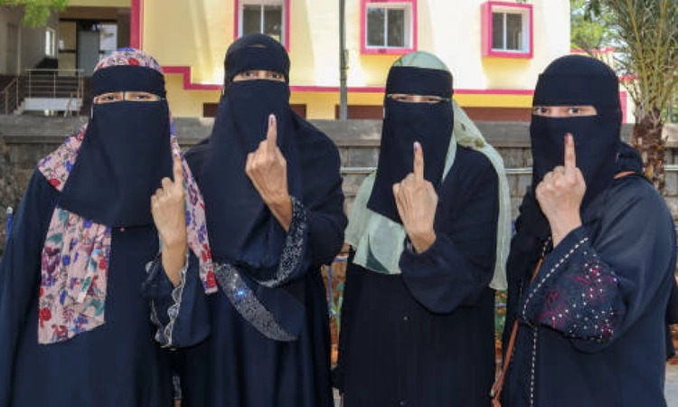 BJP urges EC to verify identity of burqa-clad voters during Bihar polls, RJD calls it political ploy