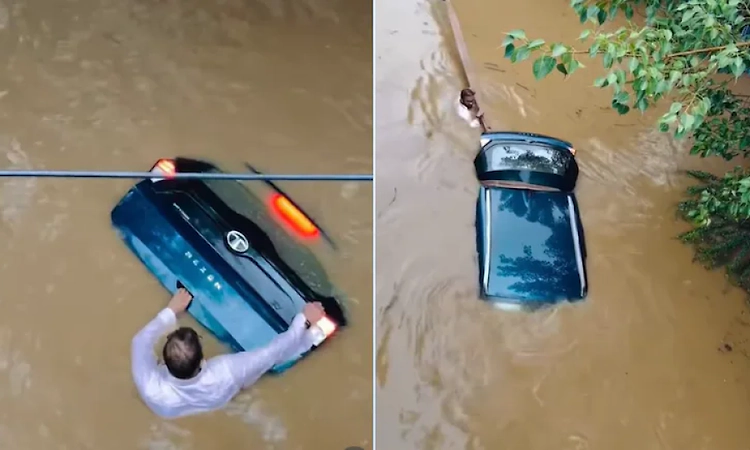 Viral video: Man risks his life in floodwaters to save his car