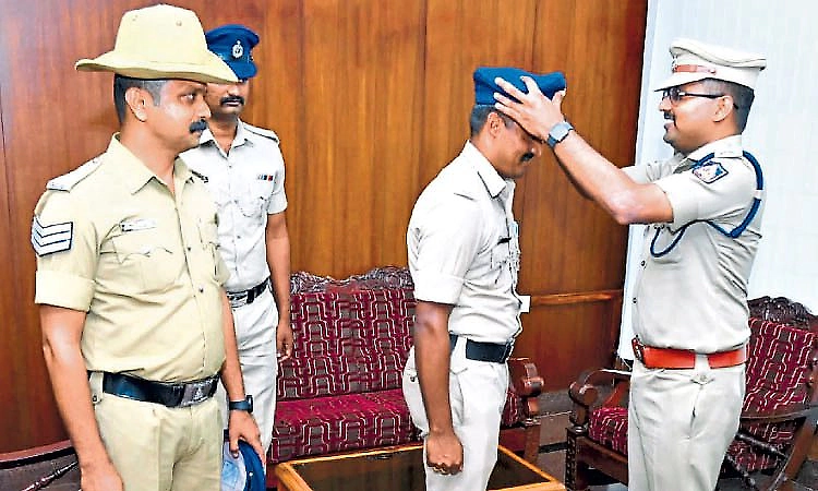 Udupi police begin receiving new peak caps under state government order