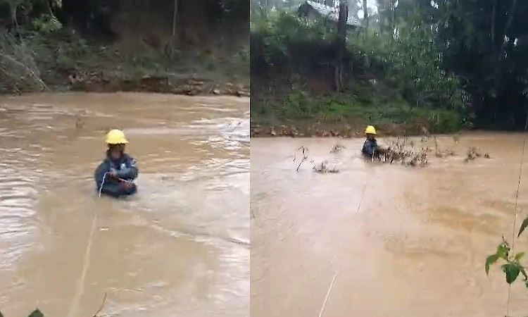 Thirthahalli: MESCOM staff swim across flooded stream to restore electricity