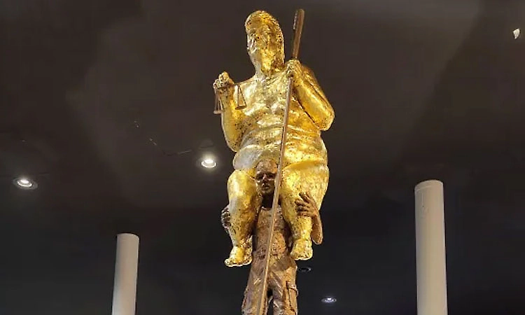 Golden naked statue of Trump installed in France in protest against US policies