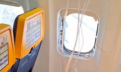 Passenger nearly sucked out after plane window detaches mid-air 