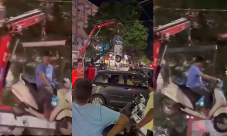 Viral video: Pune man lifted by crane after refusing to get off scooter