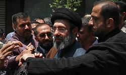 Iran's secretive top leader vows to keep up attacks in his first statement since being appointed