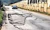 Ambalpady service road riddled with potholes; residents demand immediate repair