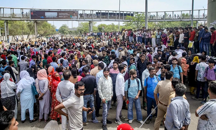 Workers' protest over wage hike turns violent in Noida, vehicles torched