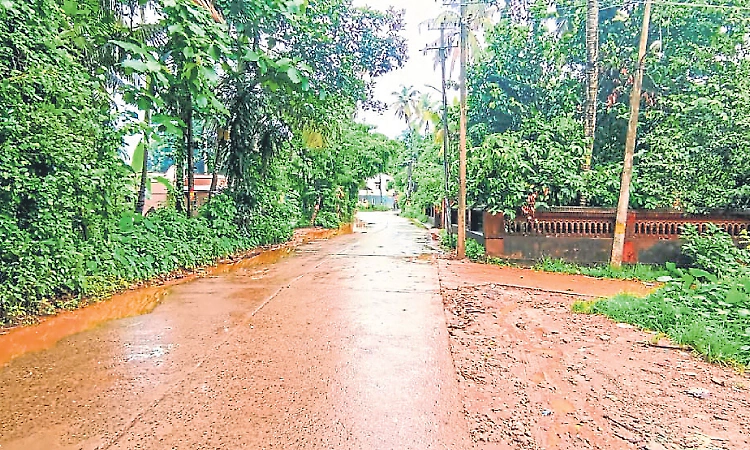 Mud-covered Indira Nagar road causes hardship for commuters in Haleangadi