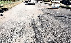 Pothole-ridden Gundibail road troubles motorists and pedestrians