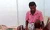 Basket weaver from Karkala draws attention at ‘Namma Sante’ in Manipal