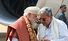 CM Siddaramaiah warmly receives PM Modi in Bengaluru