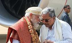 CM Siddaramaiah warmly receives PM Modi in Bengaluru