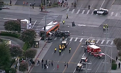 Helicopter crashes and bursts into flames, killing at least 3 people near an LA bus collision