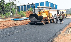 Plastic mixed asphalt road built near Puttur as waste recycling experiment