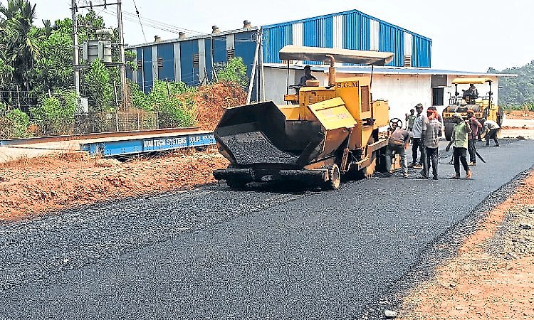 Plastic mixed asphalt road built near Puttur as waste recycling experiment