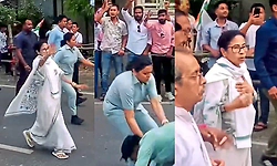 Man suddenly approaches Mamata Banerjee to touch her feet at event; CM startled