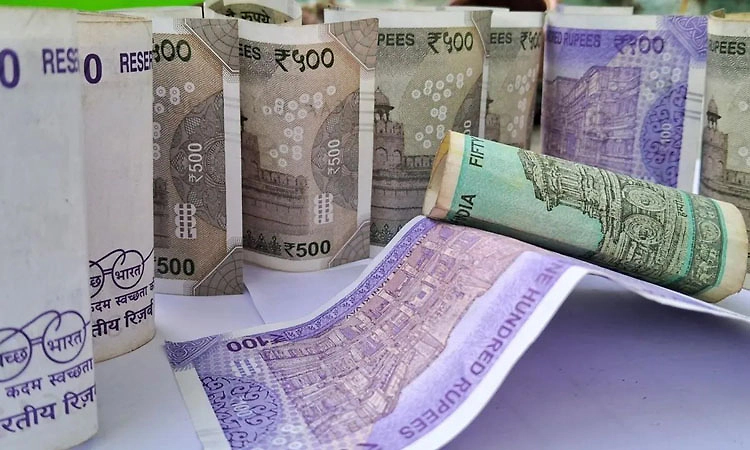 Rupee gains 12 paise to 90.66 against US dollar in early trade