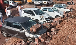 Attavar: Retaining wall collapses, cars damaged