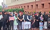 Opposition MPs dressed in black step up protest in Parliament