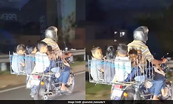 Karnataka man rides bike with five children in metal basket, sparks safety debate
