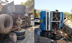 Gas cylinder-laden lorry overturns near Charmadi Ghat in Chikkamagaluru