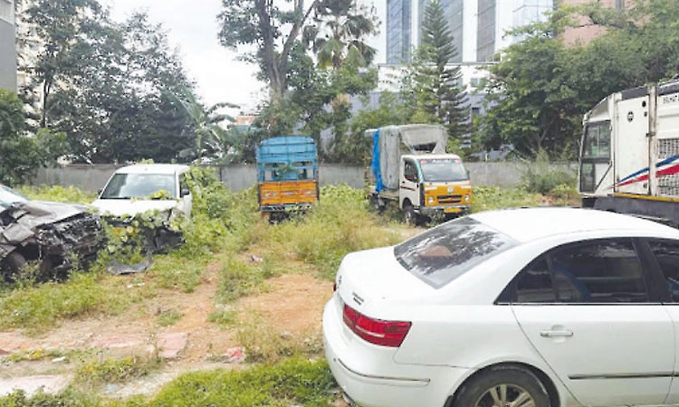 Thousands of abandoned vehicles pile up outside police stations in Karnataka
