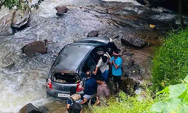 Four escape after car plunges into waterfall near Sakleshpur