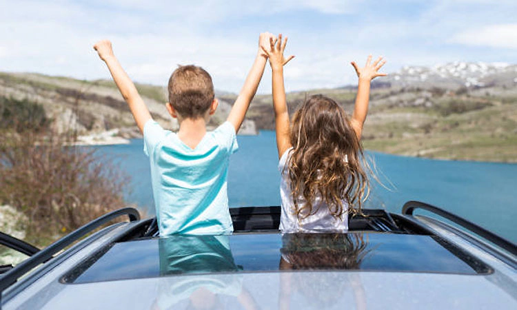Singapore: Indian-origin man charged for driving with 2 children atop car boot