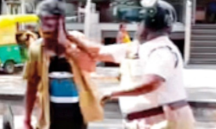 ಆಟೋ ಚಾಲಕನ ಮೇಲೆ ಸಂಚಾರ ಪೊಲೀಸ್ ಹ*ಲ್ಲೆ