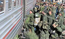 Russia offers cash bonuses, frees prisoners and lures foreigners to replenish its troops in Ukraine