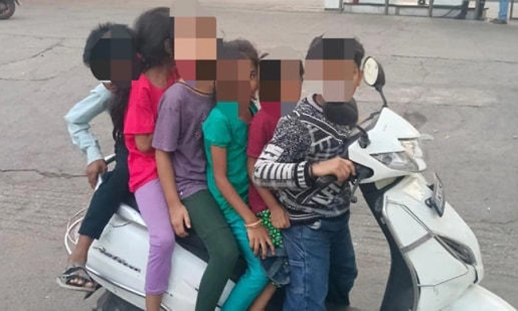 Six children seen riding single scooter in Bengaluru sparks outrage; calls for action against parents