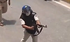 Bihar cop suspended after video shows him firing AK-47 during student protest