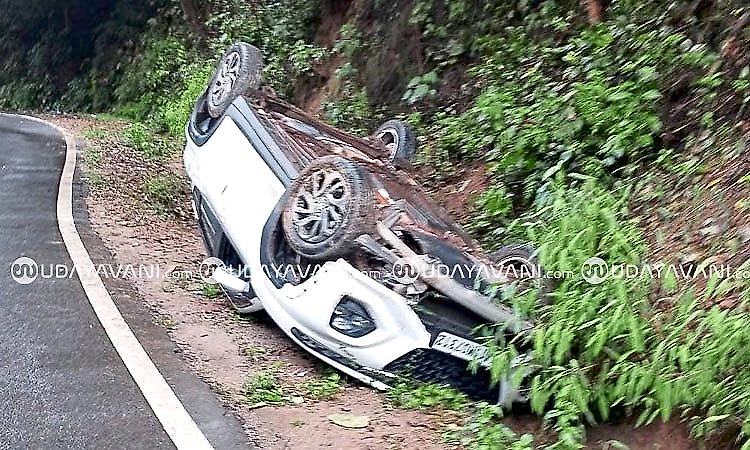 Three escape unhurt as car overturns near Charmadi Ghat 