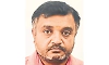 Man held for allegedly sexually harassing woman waiting for cab