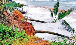 Severe coastal erosion threatens road at Hejamadi