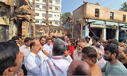 MP Kota Srinivas Poojary inspects fire accident site near Kundapur temple