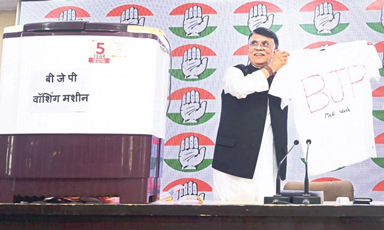Modi washing powder; ಪತ್ರಿಕಾಗೋಷ್ಠಿಗೆ ‘ವಾಷಿಂಗ್‌ ಮಷಿನ್‌’ ಹೊತ್ತು ತಂದ ಕಾಂಗ್ರೆಸ್‌!