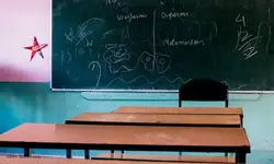 Girl loses two fingers after it gets caught in school door