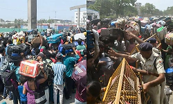 Why are thousands of migrant workers leaving Surat in Gujarat?