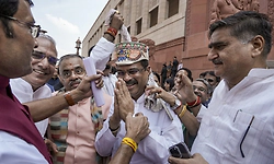 BJP greets Pradhan with 'Zindabad' slogans; opposition counters with 'Paper Chor' jibe