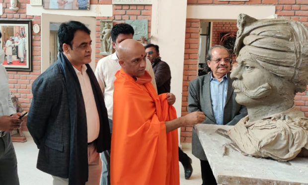 Dr.  Ashwaththa Narayana viewing 108 feet tall statue of Nadaprabhu Kempegowda