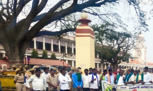 Farmers protest in front of railway station