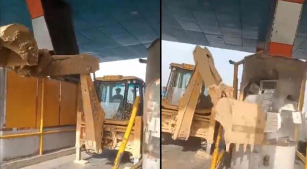 Bulldozer on booth for asking toll