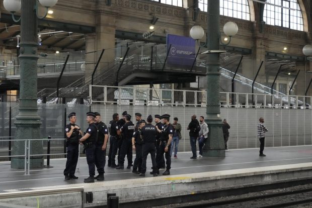 Police at French rail station – AP