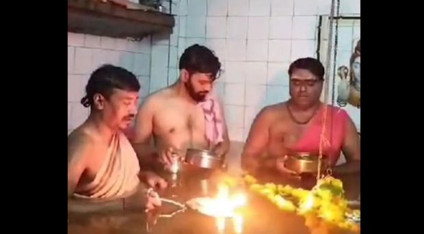 Sankeshwar: ಉಕ್ಕಿ ಹರಿದ ಹಿರಣ್ಯಕೇಶಿ ನದಿ; ನೀರಿನಲ್ಲೇ ಶಂಕರಲಿಂಗ ದೇವರಿಗೆ ಆರತಿ